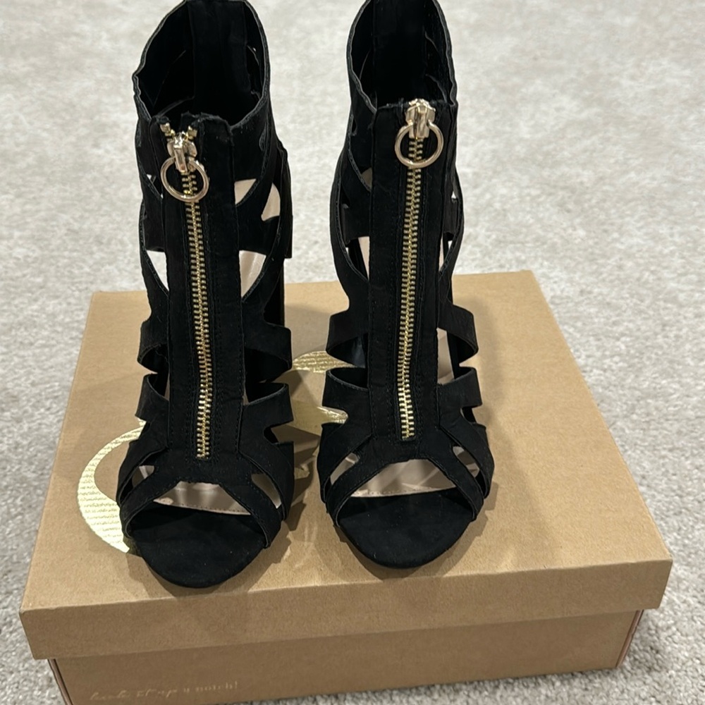 Black suede heels with gold zipper, size 7 brand new